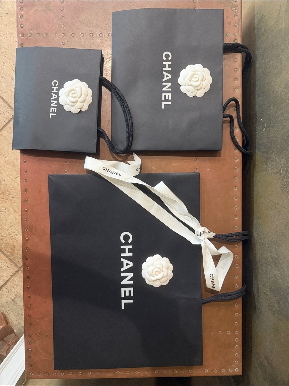 3 CHANEL Black Shopping Bags with White Camellia and Ribbon
